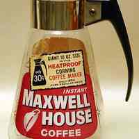 Glass carafe with handle for making Maxwell House Instant Coffee. No date, ca. 1960