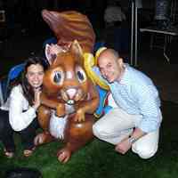 Color photo of buyers with a chipmunk sculpture at Hoboken Historical Museum Benefit Auction, Hoboken, April 28, 2007.