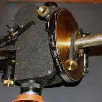          detail bottom of theodolite with pin to insert in gimbal mount
   