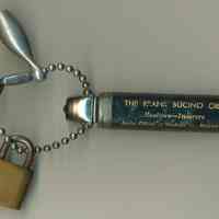 Key chain with 3 charms and promotional flashlight from The Frank Bucino Organization, Real Estate, Hoboken, no date, ca. 1950-1960.