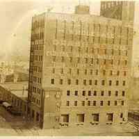 Digital image of sepia-tone photo of the Nungesser-Dickinson Seed Company building, 1203-1209 Hudson Street, Hoboken, [1923].