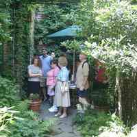 Digital color image of the gardens and people on the Secret Gardens Tour, Hoboken Historical Museum, Hoboken, June 9, 2002.