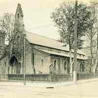 Sepia-tone photo of Trinity Episcopal Church on Washington Street at the northeast corner of Seventh St., Hoboken, no date, ca. 1890-1900.