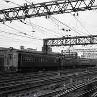 B+W photo negative of Erie Lackawanna Railway MU 3203 in Hoboken yard, Apr. 1968.