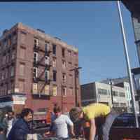 Color slide of buildings under renovation on or near First and Clinton Sts., Hoboken, ca. 1983-84.