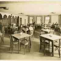 Sepia-tone photo of the interior of cafeteria dining room at the Y.M.C.A., 13th & Washington Street, Hoboken, no date, ca. 1929.