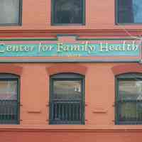 Color photo of a wall sign for Center for Family Health of St. Mary, 122-132 Clinton Street, Hoboken, Jan. 3 & 4, 2002.