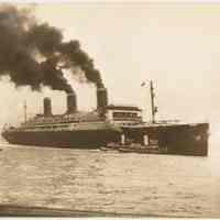 Sepia-tone photo of Leviathan leaving Hoboken for Scotland to be scrapped, Jan. 25, 1938.