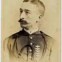 Cabinet photo of man with mustache in military uniform wearing several medal, no date, circa 1885-1890.