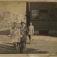 B+W photos of John J. Grogan (foreground) of Hoboken holding strike sign, no place, no date