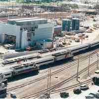          Digital image of color photo of an aerial view of New Jersey Transit passenger trains locomotives in the yard, Hoboken Terminal, Hoboken, Sept. 2002. picture number 1
   