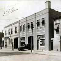 Sepia-tone photo of the Model Garage, 214 Clinton St., Hoboken, 1925.