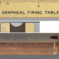          details: name, right end without slide; view of long edge (masonite at top)
   