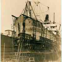 Sepia-tone photo: the S.S. Commercial Trader in dry dock at Bethlehem Steel Shipyard, Hoboken Division, Aug 8, 1940.