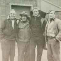 B+W group photo of "On the Waterfront" filming in Hoboken: Marlon Brando is second from the right, Hoboken, no date, ca. late 1953-early 1954.