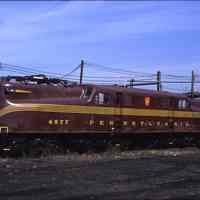 Color slide of former Pennsylvania Railroad GG-1 locomotive No. 4877 in Hoboken rail yard, March 11, 1989.