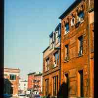 Color slide of eye-level view of rear facade of the Hoboken Land Building at 1 Newark looking NW