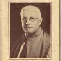          pg [1] printed photo of Monsignor Eugene P. Carroll
   