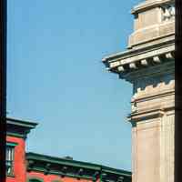          Color slide of detail view of cornices, brackets, dentils, window heads and fire escape at 44 and 47 Newark on the corner of Hudson and Newark picture number 1
   