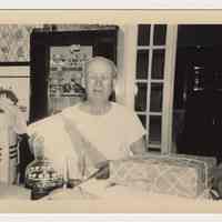 Digital image of b+w photo of Nicola Principe seated at a kitchen table, 416 Clinton St., Hoboken, n.d., ca. 1950s.