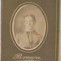 Sepia-tone photo of an unidentified boy posed in studio, Hoboken, no date, ca. 1890-1910.