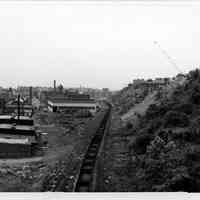 B+W photo of view south of factory buildings at Monroe and 13th St., Hoboken, n.d., ca. 1965-1969.