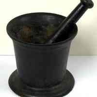 Iron mortar & pestle used for pharmaceutical preparations by Dr. Junius Zenneck of Hoboken, n.d, ca. 1900-1940.