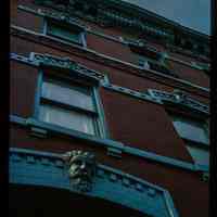 Color slide of detail view of façade, cornice, gauged arches, and keystones at 1226 Park between 12th & 13th