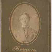 Sepia-tone photo of an unidentified boy posed in studio, Hoboken, no date, ca. 1890-1910.