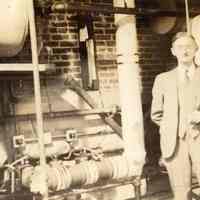 Digital image of photo of Julius Durstewitz, right, in boiler room, Hoboken Recreation Center, 113 Jefferson St.,n.d., ca. 1938.