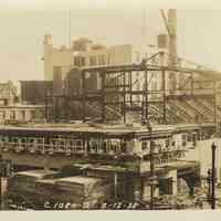 Sepia-tone photo of steel frame erection & Newark St. frontage for the Fabian Theatre, Newark & Washington Sts., Hoboken, March 12, 1928.