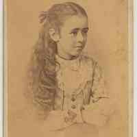 Carte-de-visite of young girl posed in photo studio, Hoboken, n.d., ca. 1880-1887.