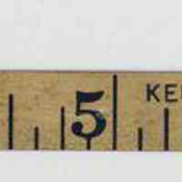          detail tape end with maker's marks; end ring
   