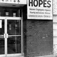 B+W photo of the sign and entrance for the administrative offices of HOPES, 124 Jackson St., Hoboken, N.J., no date (ca. 1968-1972).