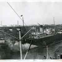 B+W photo of the Italian freighter Ida docked at Hoboken pier after charges of opium smuggling, Jan. 6, 1939.