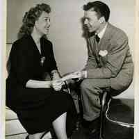Sinatra photo: Frank Sinatra presenting donation check to Rise Stevens for Metropolitan Opera Fund (New York, no date, circa 1945-1947.)