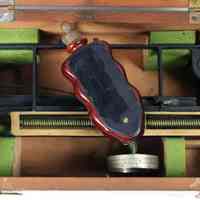          closer view of instrument stored in case
   