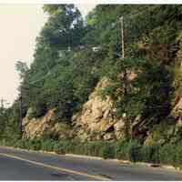 Color photos, 2, of cliff face on River Road at about 6th to 7th Sts., Hoboken, July 1984.