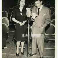 Sinatra photo: Frank Sinatra with fan contest winner Rita Stearns in radio studio, N.Y., N.Y., Dec. 27, 1943.