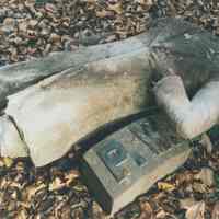          Digital image of color photo of a broken torso from the cemetery monument for Peter Woodward, Jersey City, N.J., Nov. 2002. picture number 1
   