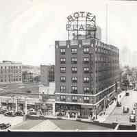 B&W photo of the mixed-use Hotel Plaza at 91 Sip Avenue, Jersey City.