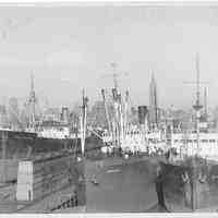 B+W photo of the S.S. Helgoland in dry dock; 2 ships berthed south of dry dock, Hoboken, no date, ca. 1940.