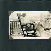          09 man in rocking chair on porch
   
