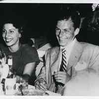 B+W photo of Nancy Barbato Sinatra & Frank Sinatra at restaurant or nightclub, probably N.Y., n.d., ca. 1944-1945.