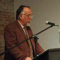 Color photos, 4, of Fred Gardaphe presenting lecture on Pietro di Donato at Museum, Feb. 26, 2006.