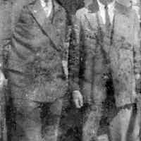 Digital image of tintype photo of two men in suits posed outside, no place (Hoboken?), no date, circa 1910-1915.