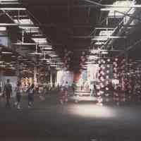 Color photo of artwork on display inside Pier C shed during Celebration 