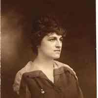 Digital image of photo of Marie Durstewitz wearing a nursing or Red Cross service pin, no place (Hoboken), no date, ca 1898 - 1910.