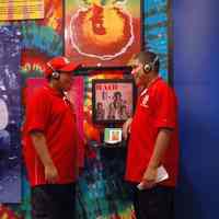 Digital images, 3, of two visitors listening to "Hair" CD at exhibit, Hoboken Tunes, HHM, Hoboken, Sept. 18, 2007.