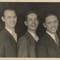 B+W publicity photo of singer Johnny Ryan, center, with 2 unidentified men. (New York), no date, ca. mid-1930